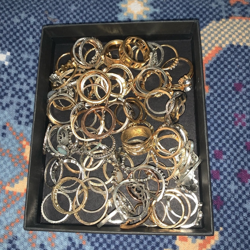 mixture of gold & silver rings